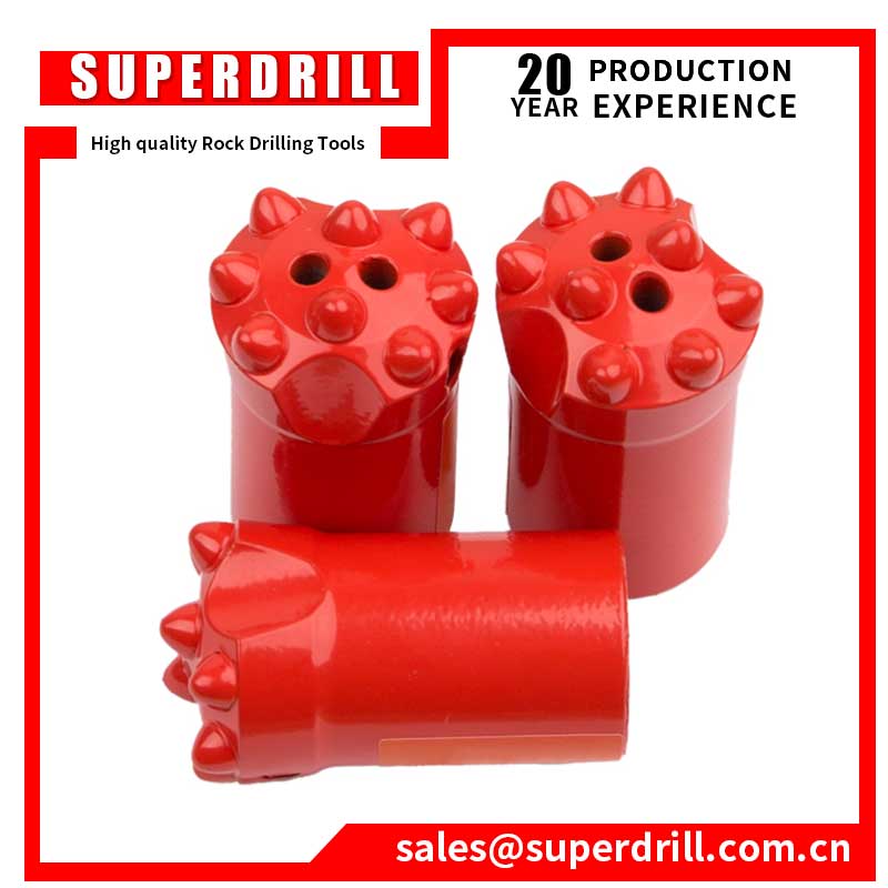 Top hammer rock drilling tools Button bits