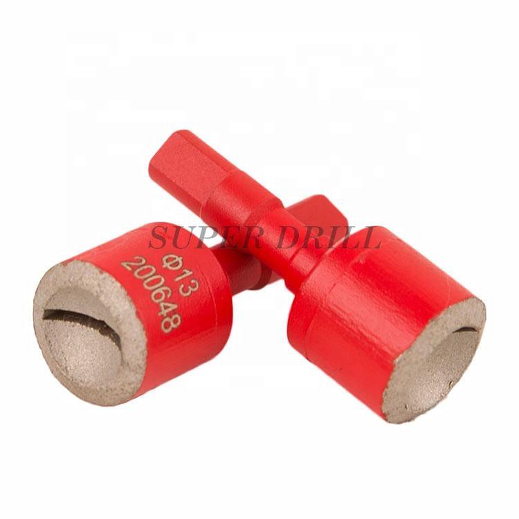 Rock drilling grinder pin cups