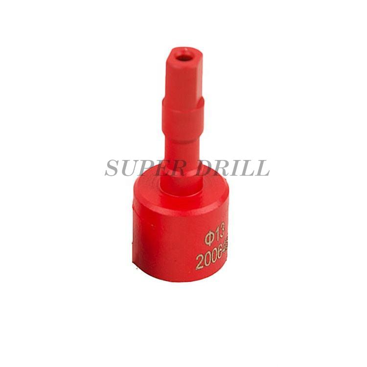 Rock drilling grinder pin cups